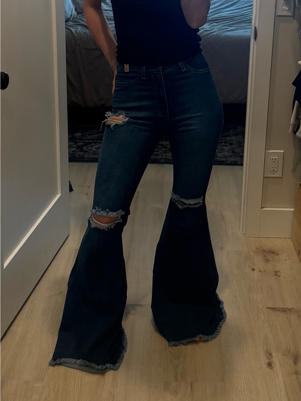 High rise flare distressed jeans